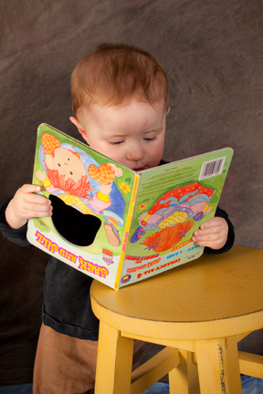 Child reading, child portrait